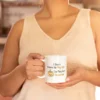 Coffee-mug-mockup-featuring-a-happy-cropped-face-woman.