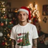 a-mockup-of-a-tattooed-man-wearing-a-t-shirt-in-a-xmas-decorated-room